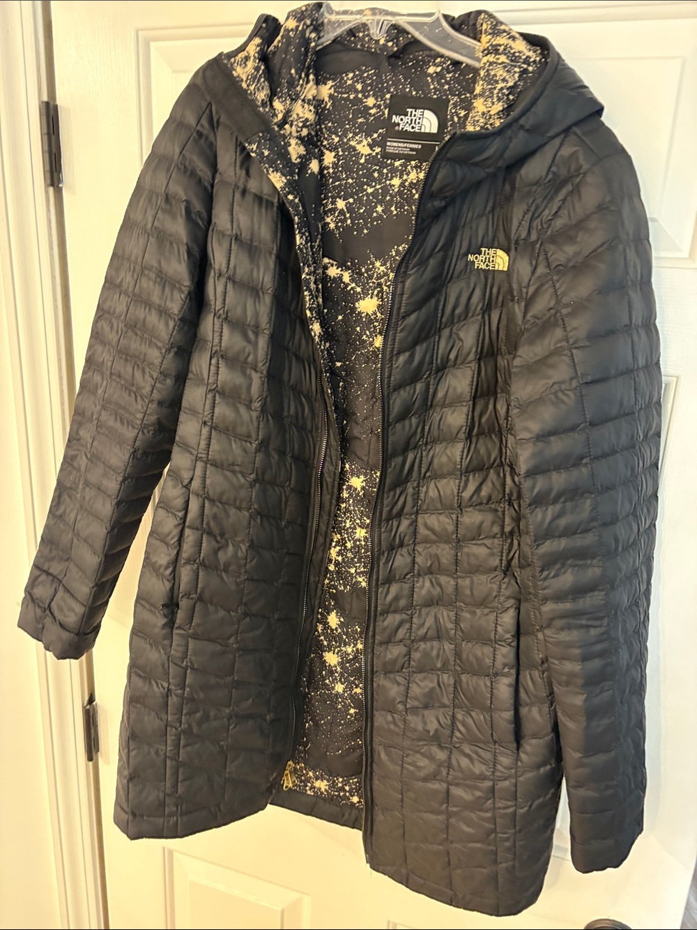 The North Face Women's Black Hooded Quilted Puffer Coat with Star Lining
